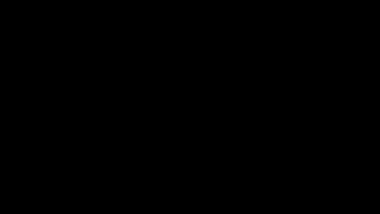 The first frame of the test clip. It is almost completely black, with the outline of trees barely visible at the bottom right.